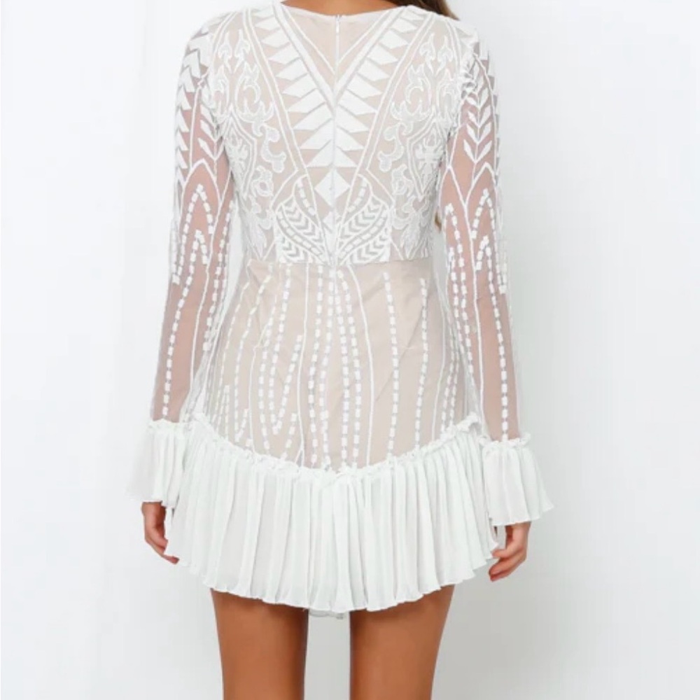 Elegant white embroidered Saints & Secrets Dress.